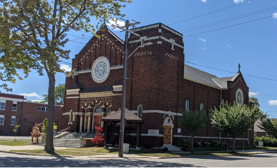 Dark brown bricked church.