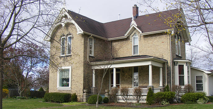 Yellow brick home.